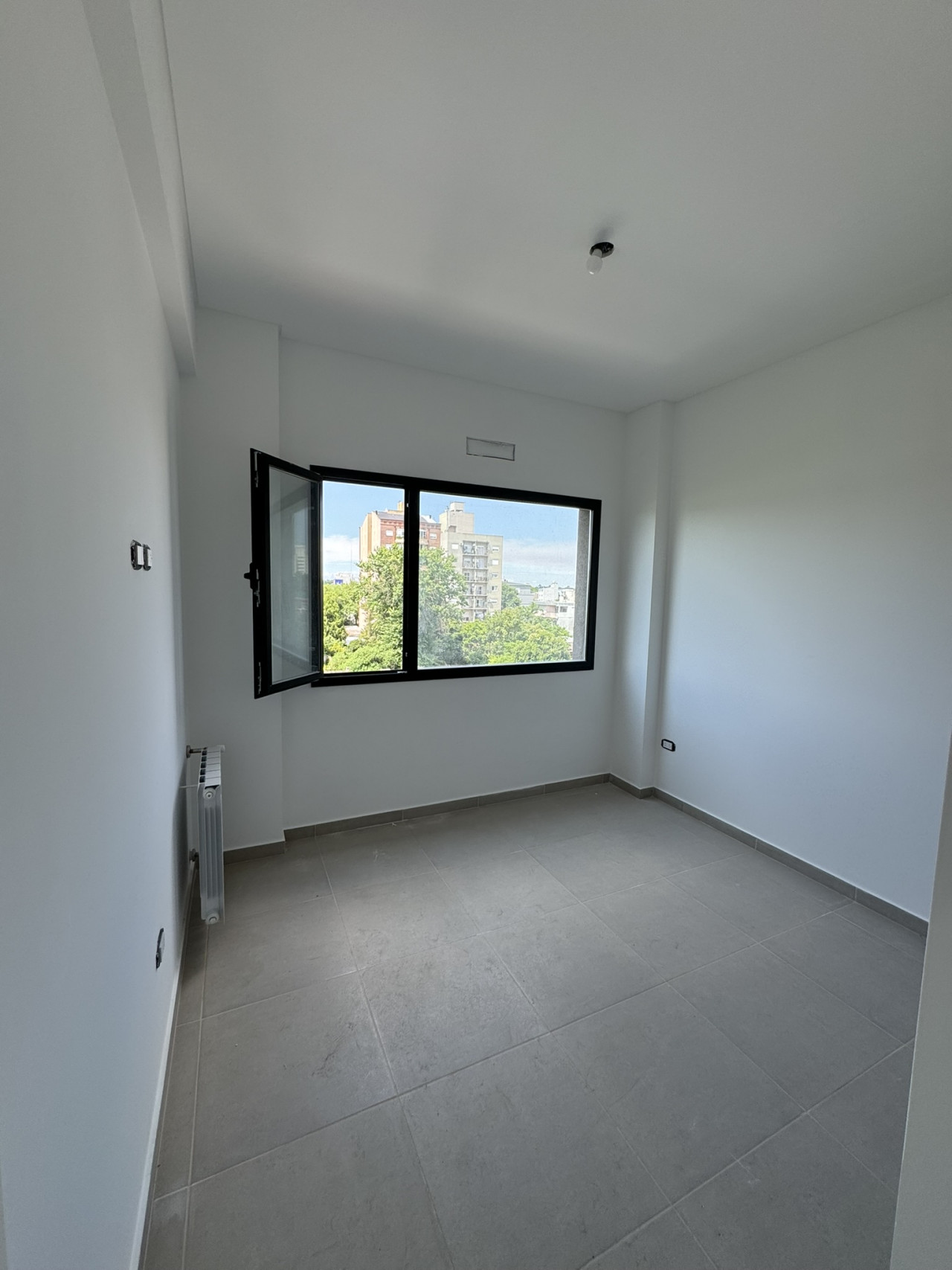 DORMITORIO CON RADIADOR